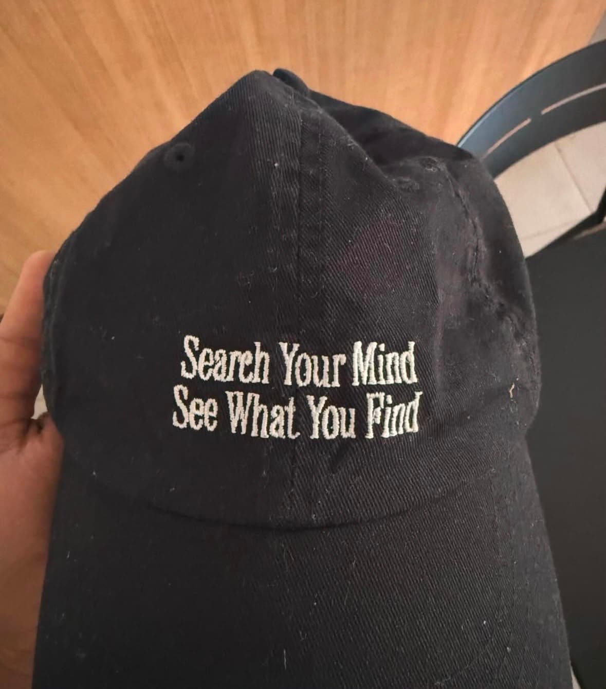 a cap that says search your mind see what you find